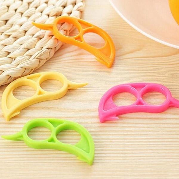 Wukusy Snail Barker creative ring-shaped orange peeler with ergonomic design, perfect for peeling oranges easily and efficiently.