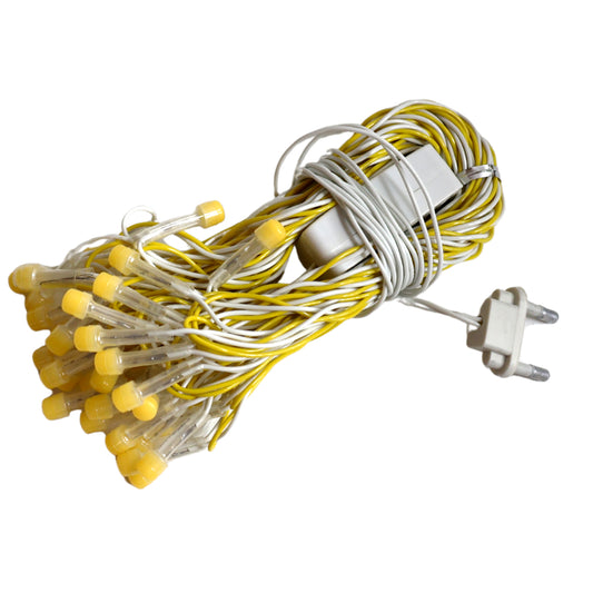 Wukusy 10-meter LED decorative string fairy lights for home decor, featuring warm white glow and flexible design.