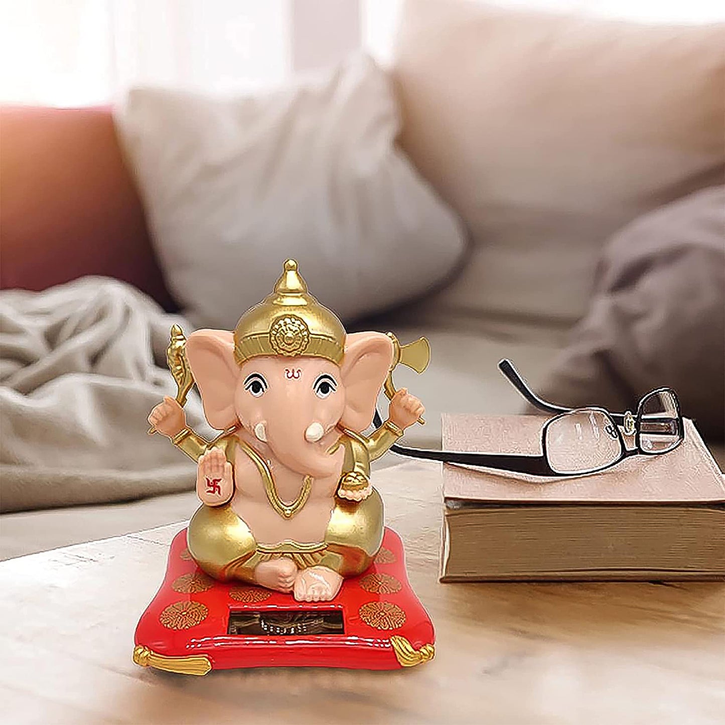 Solar-powered Dancing Ganesha idol, decorative Lord Ganpati showpiece with movement, Wukusy home decor for spiritual ambiance.