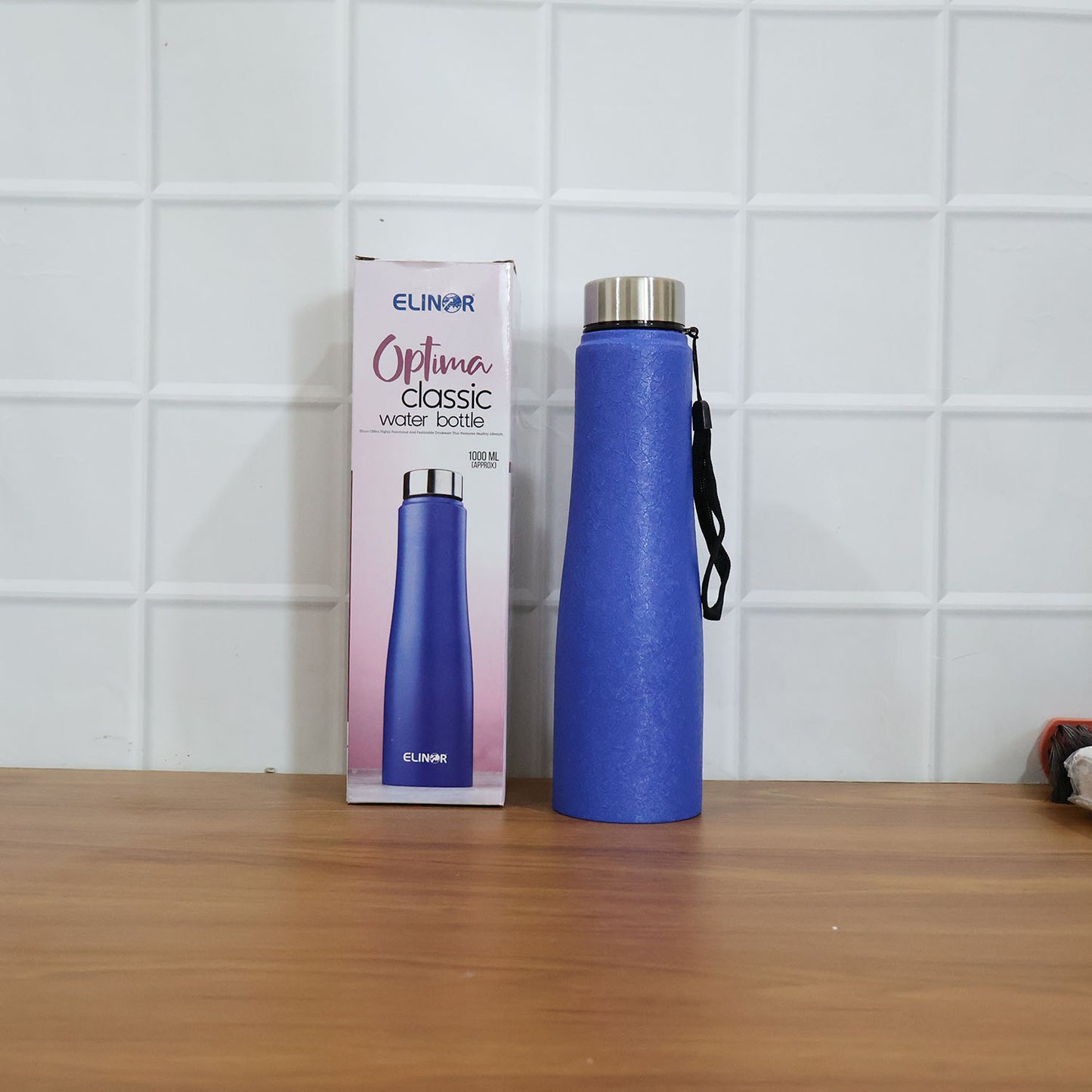 Blue Wukusy stainless steel water bottle, 1000ml capacity, durable and sleek design for everyday hydration.