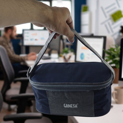 Wukusy Ganesh Neo Fusion 3 stainless steel lunch box set with three compartments and secure lids for food storage.