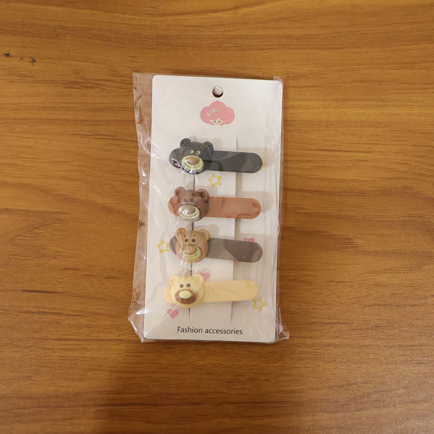 Set of four Wukusy cute bear face decorative hair clips, with adorable bear designs for girls' hair accessories.