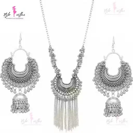 Silver bold necklace and earrings set for women with oxidized finish, featuring intricate jewelry design by Ekom.