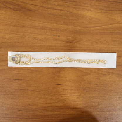 Gold-tone designer chain necklace by Wukusy, featuring a stylish and elegant link design, displayed on a neutral background.
