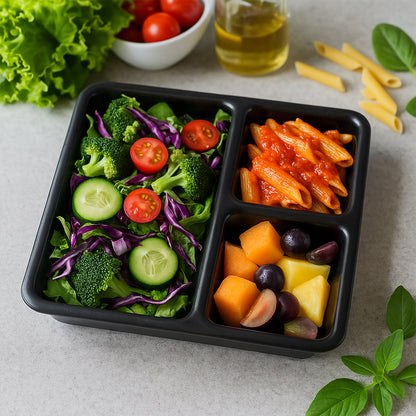 Black plastic multi-compartment meal serving tray with three sections, ideal for dining and food presentation.