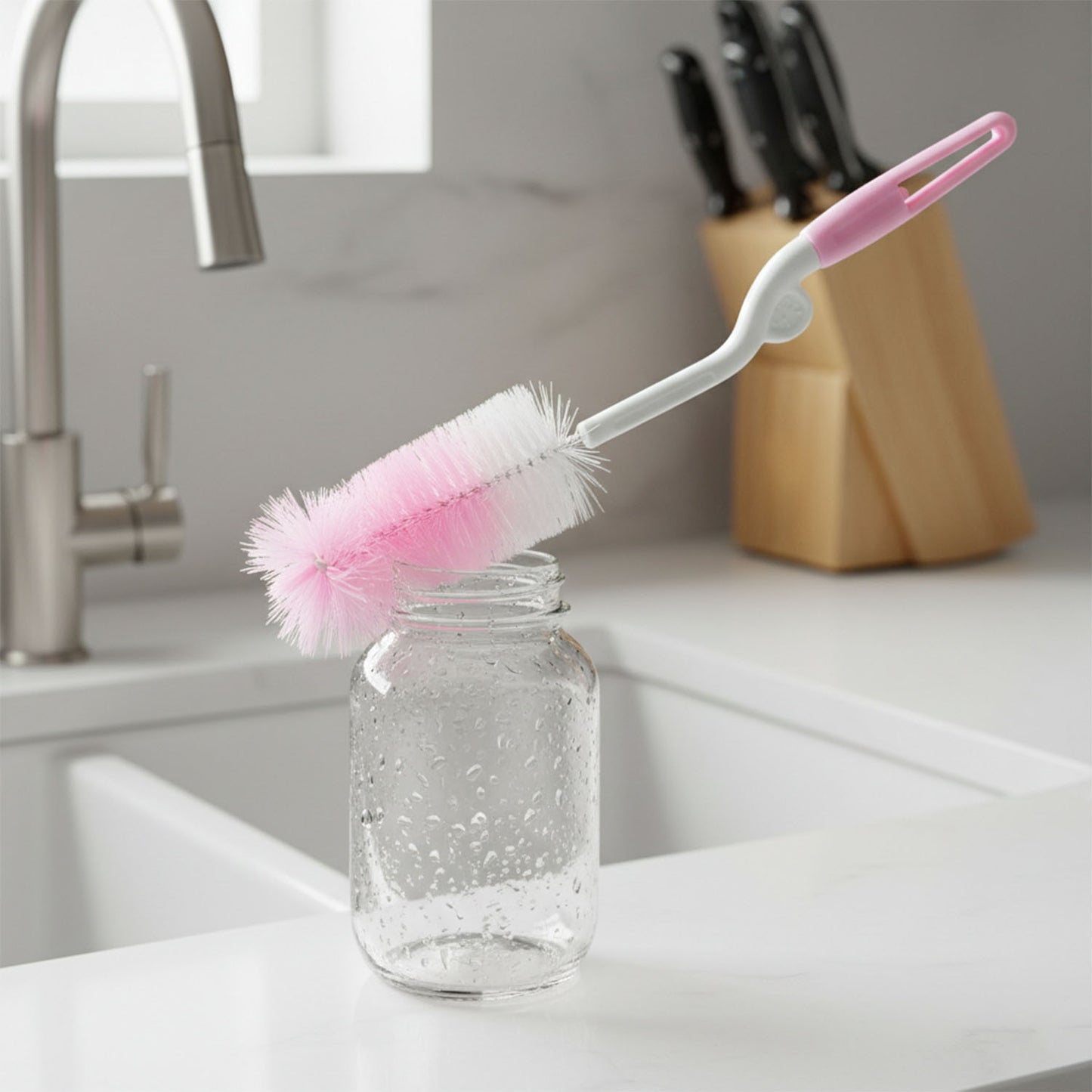 Wukusy bottle nipple cleaning brush with 360 rotary handle for thorough cleaning of baby bottle nipples.