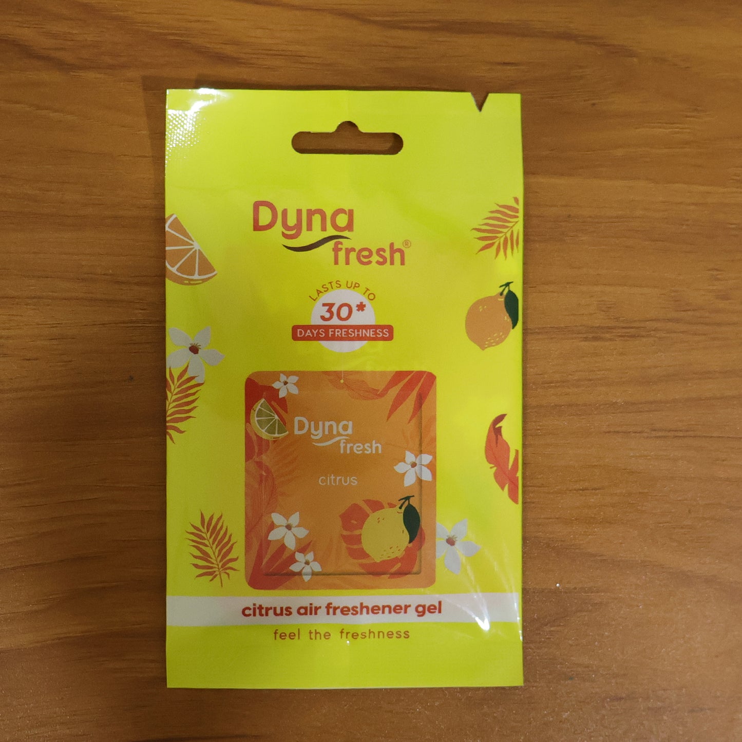 Wukusy Citrus Hanging Air Freshener Gel, 10gm, showing a small gel air freshener with citrus scent in a hanging container