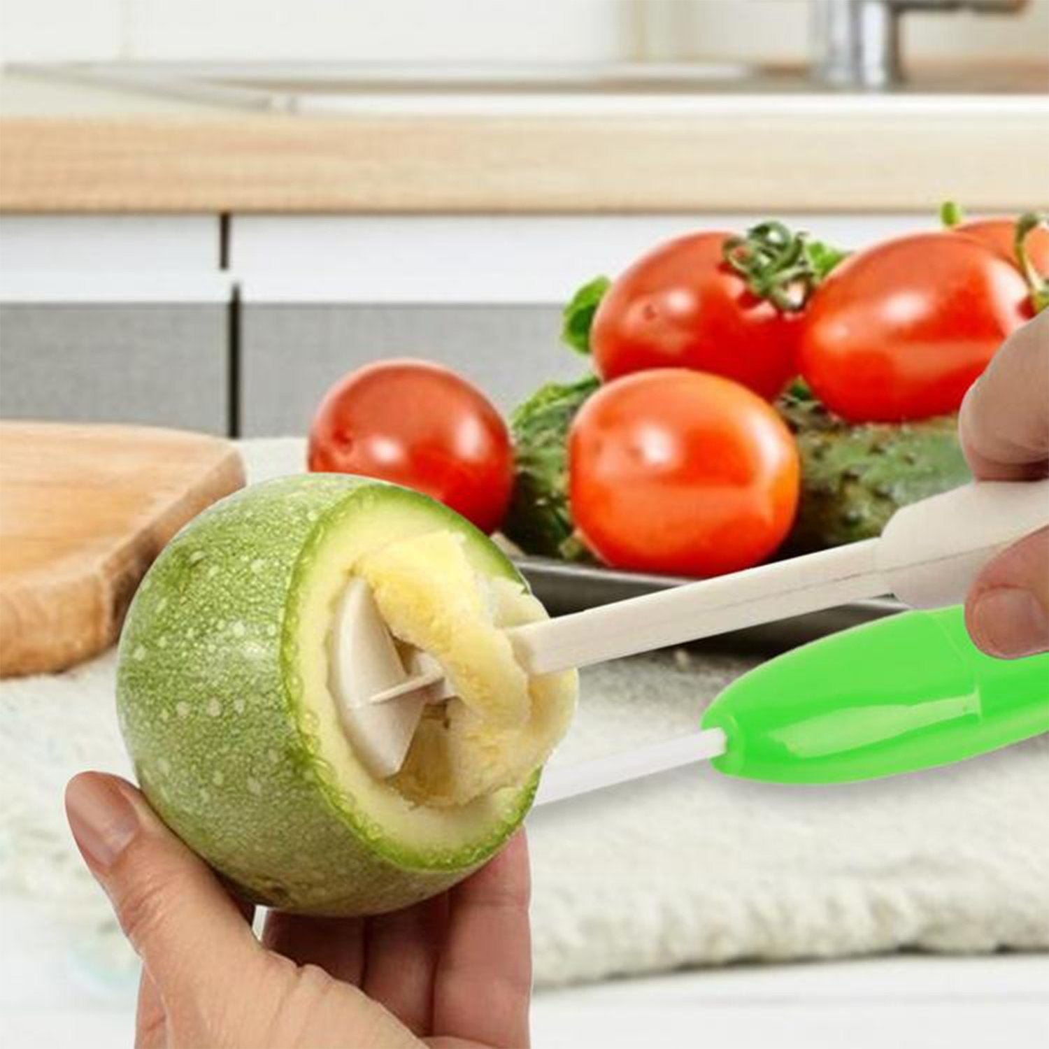 Wukusy Veg Drill spiralizer kitchen tool for creating stuffed vegetable shapes, featuring a colorful handle and stainless steel blades.
