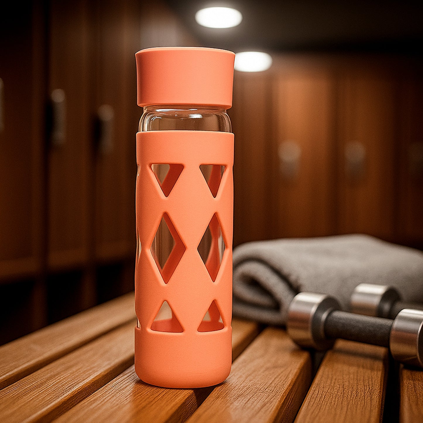 Glass water bottle with protective sleeve, 480 ml, from Wukusy, featuring a transparent design and durable cover.