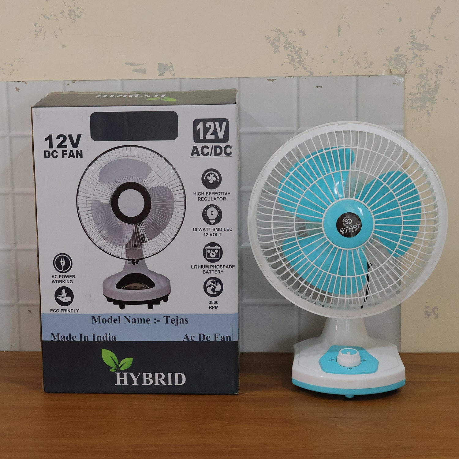 Wukusy 12V DC table fan with adjustable speed control and high airflow, shown on a desk in a home office setting