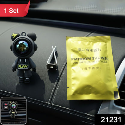 Cute astronaut car air freshener with vent clip by Wukusy, hanging from a car vent, featuring a playful astronaut design.