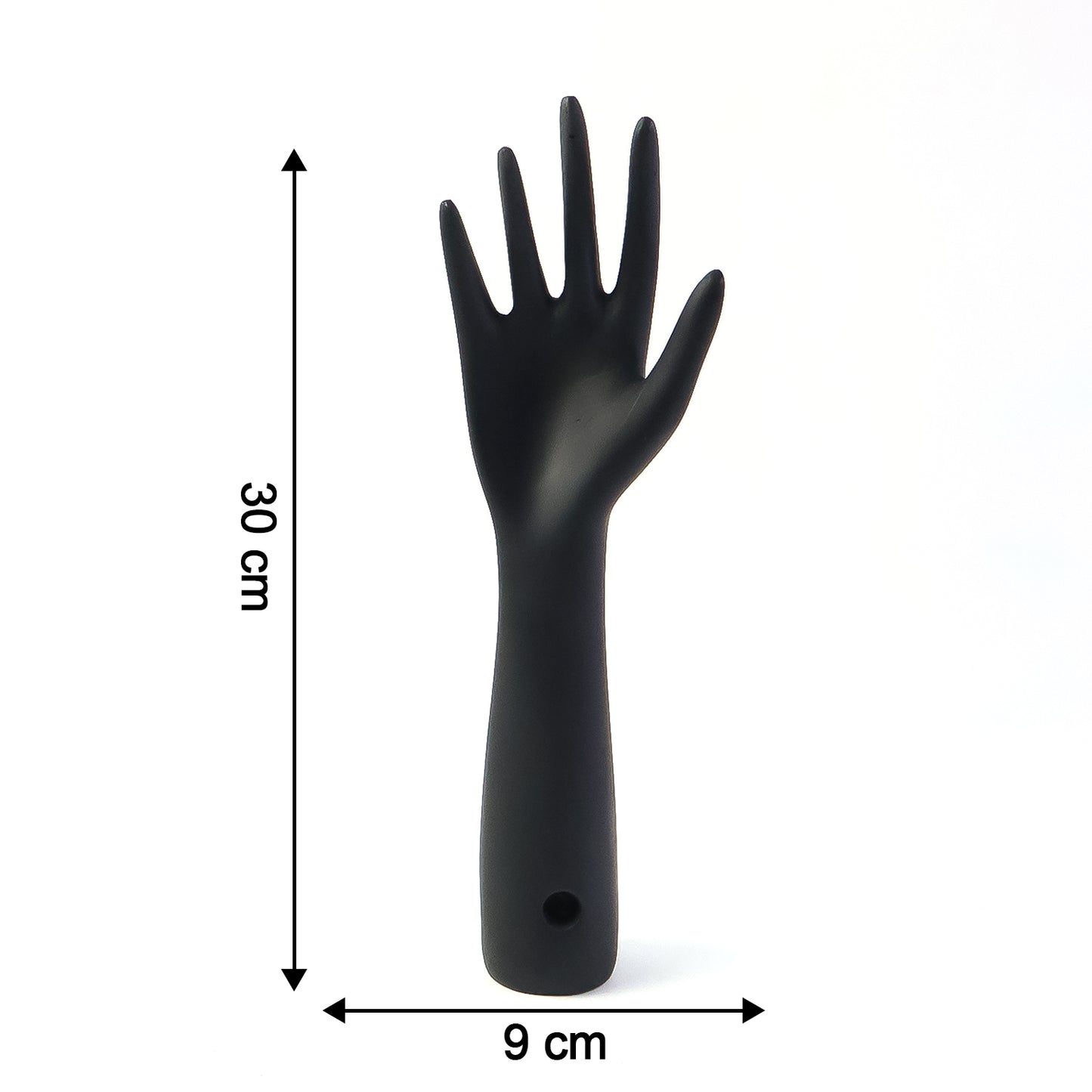 Black hand-shaped jewelry display stand by Wukusy showing multiple rings and necklaces on a white background