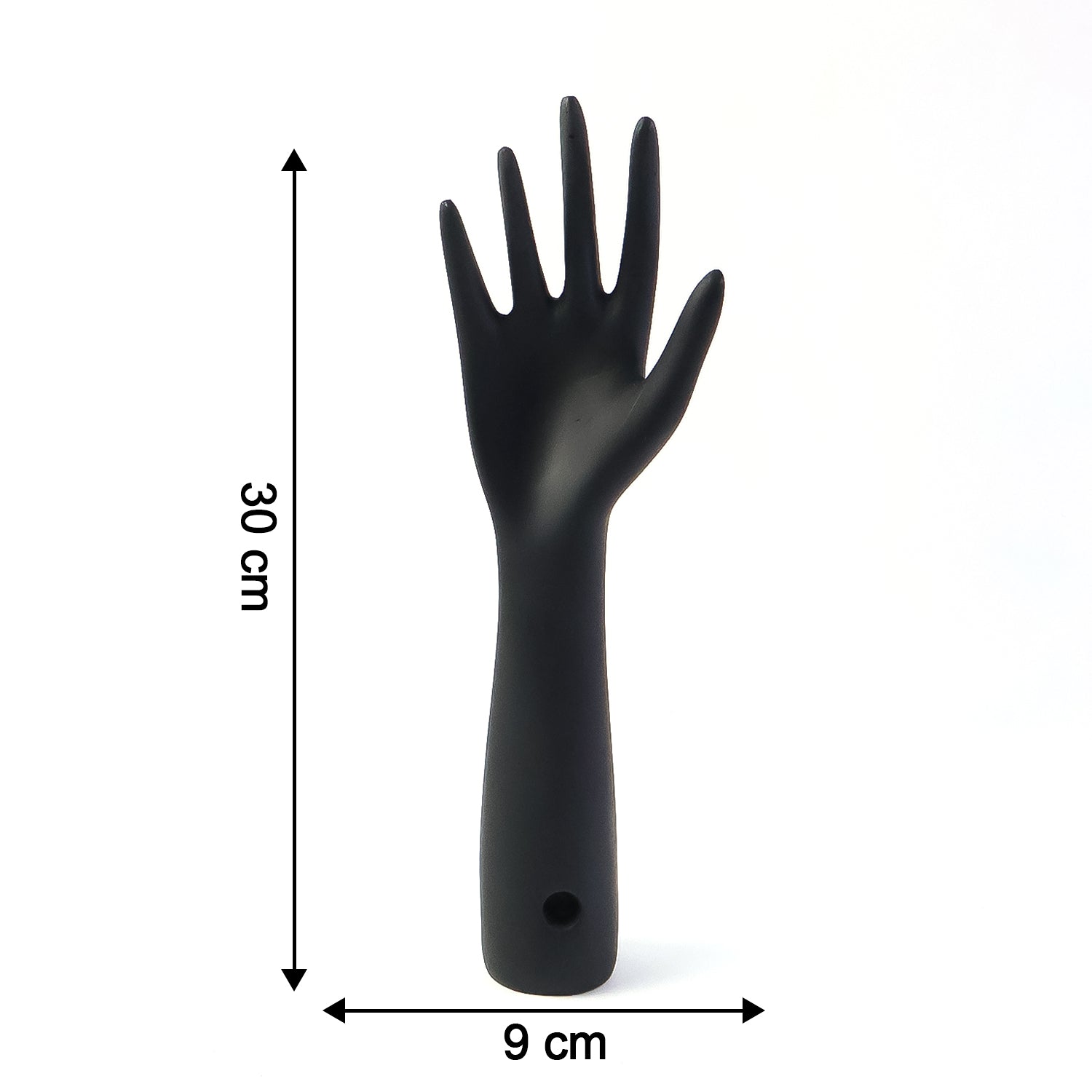 Black hand-shaped jewelry display stand by Wukusy showing multiple rings and necklaces on a white background