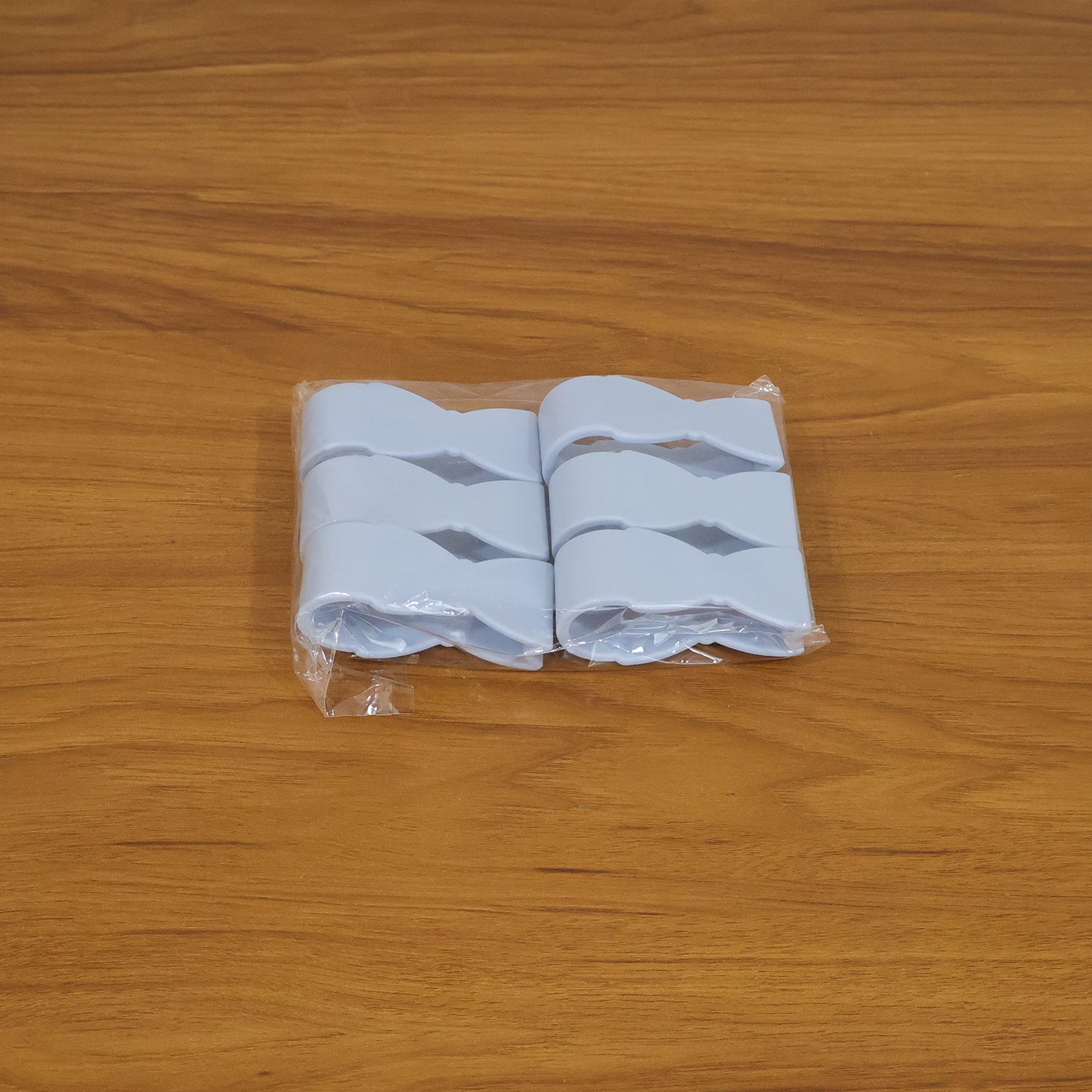 Set of six Wukusy multipurpose towel holder clips, metal and plastic, for kitchen or bathroom organization.