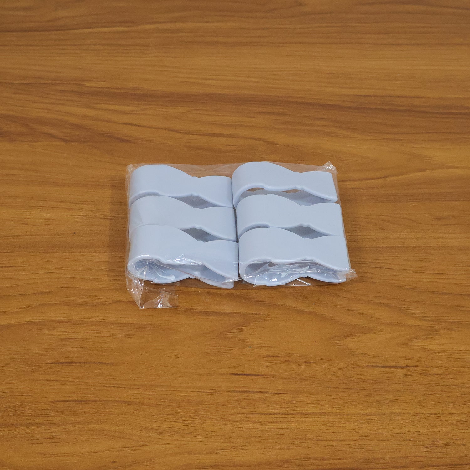 Set of six Wukusy multipurpose towel holder clips, metal and plastic, for kitchen or bathroom organization.