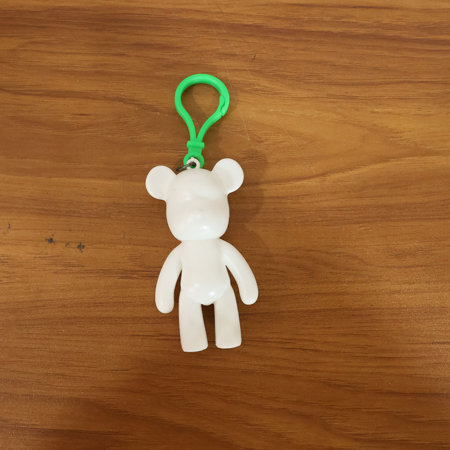 Wukusy cute bear-shaped decorative keychain hanging with detailed bear design and vibrant colors.