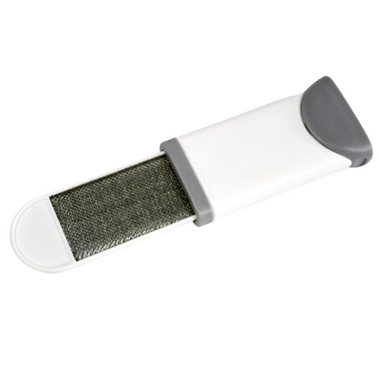 Wukusy 1297 Magic Lint Remover clothes and pet fur brush with double-sided electrostatic design for static dust and hair removal.