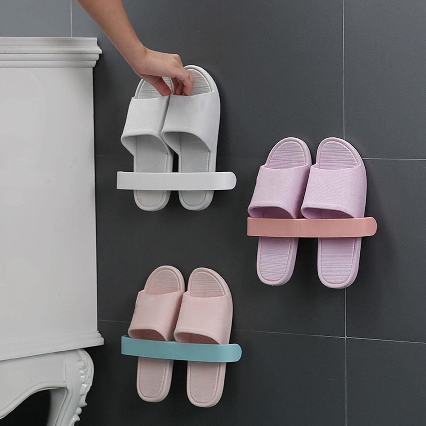 Wall-mounted bathroom towel and slipper hanging rack by Wukusy, self-adhesive, designed for home improvement and organization.