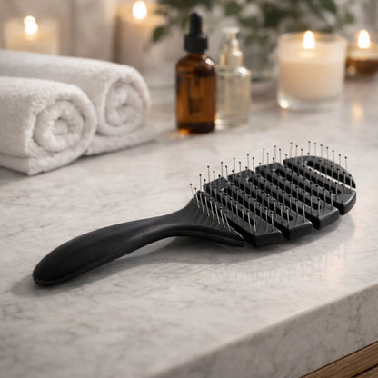 Wukusy premium detangling hair styling brush with flexible vent design for smooth, pain-free hair combing and styling.