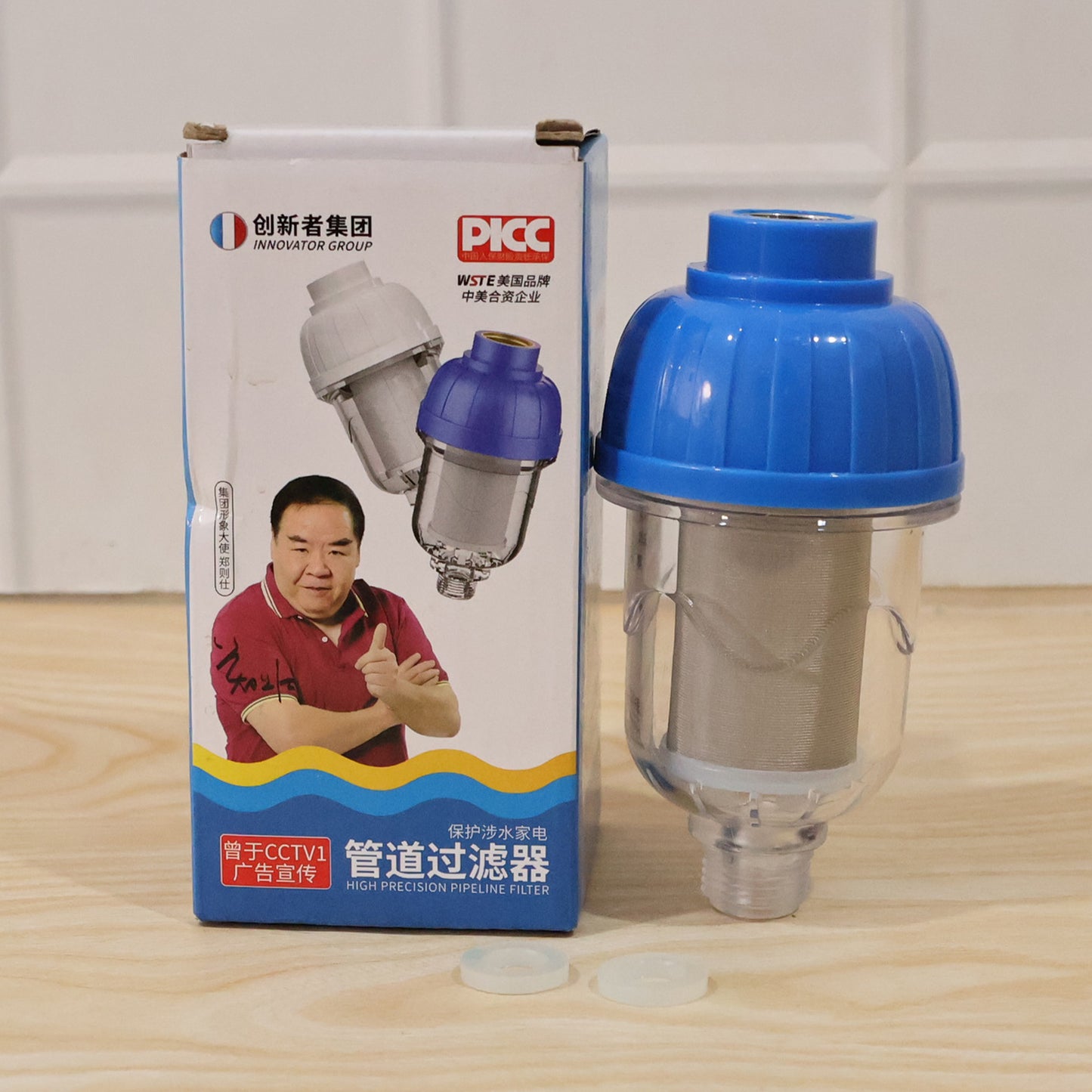 Wukusy hard water shower filter with multi-layer purification system, installed in a bathroom shower for cleaner water.