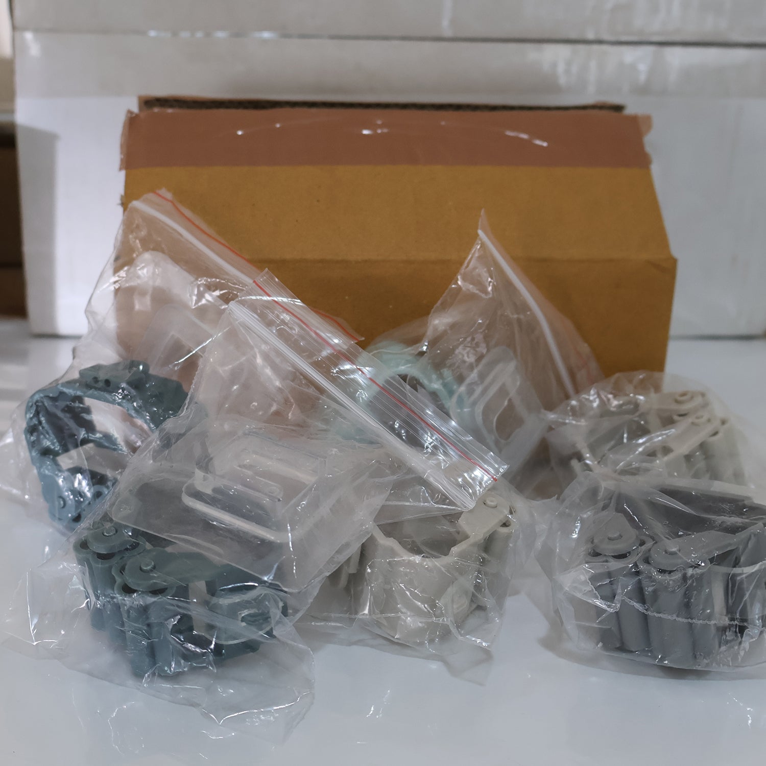 Set of six Wukusy self-adhesive mop and broom holder clips for organizing cleaning tools in home improvement projects.