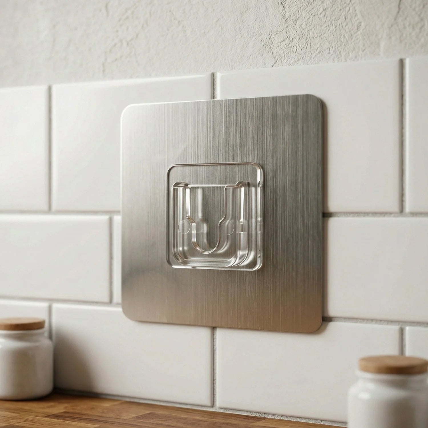 Heavy duty Wukusy self-adhesive utility wall hook attached to a wall for hanging tools or accessories