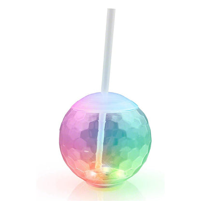 Wukusy LED glow drink cup with straw, illuminated plastic cup for beverages, glowing in vibrant colors in a dark setting