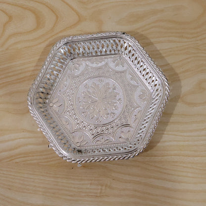 Decorative silver serving tray with traditional embossed floral design, crafted by Wukusy for elegant tableware presentation.