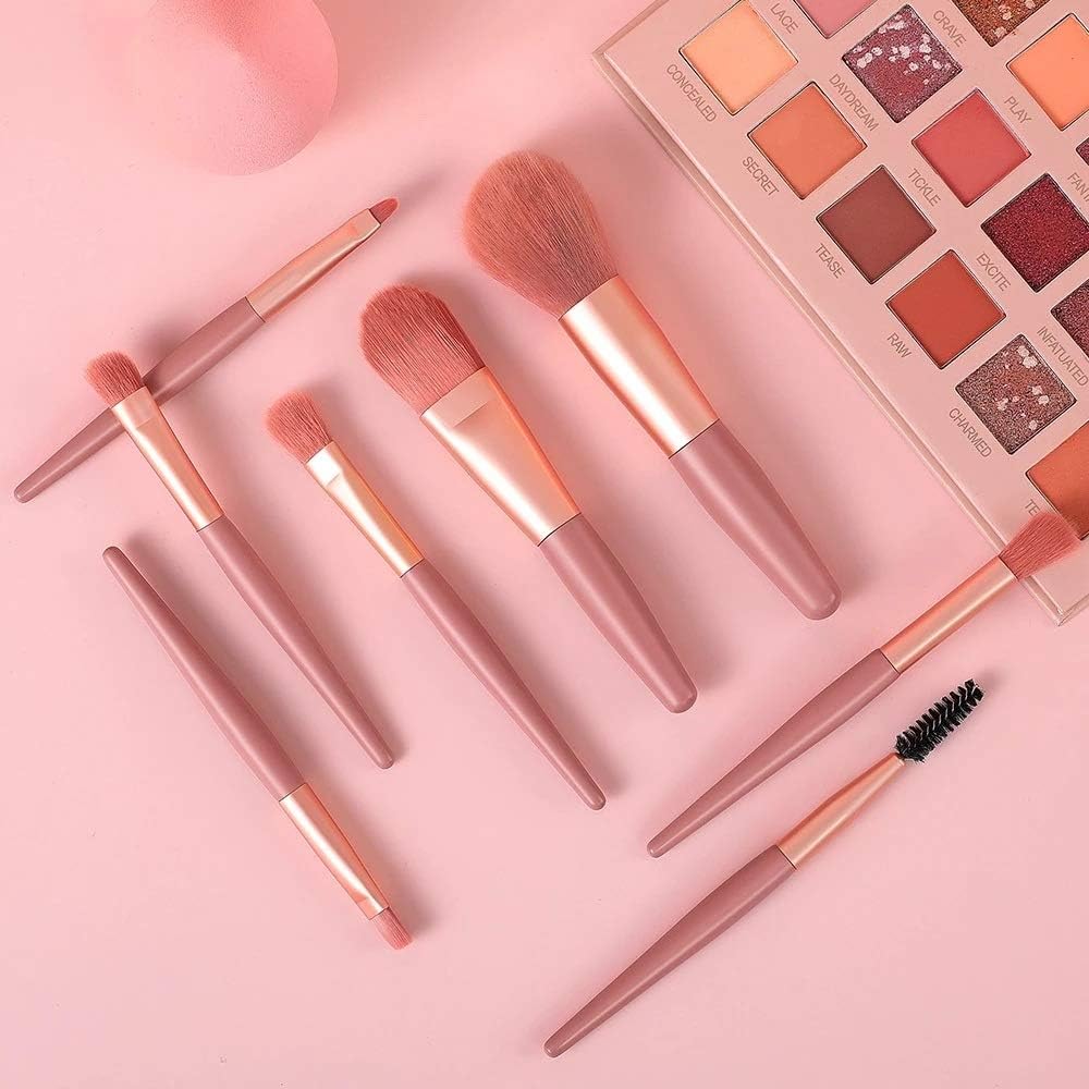 Wukusy 1460 mini makeup brush set with 8 portable cosmetic brushes including foundation, blush, eyeshadow, and lipstick brushes.