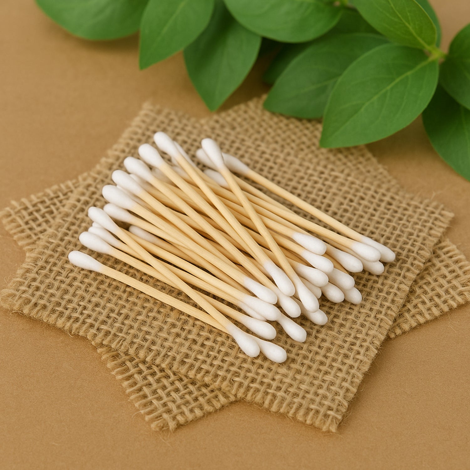 Eco-friendly wooden cotton ear buds from Wukusy, 100 pcs in a packet, with natural wooden handles and white cotton tips.