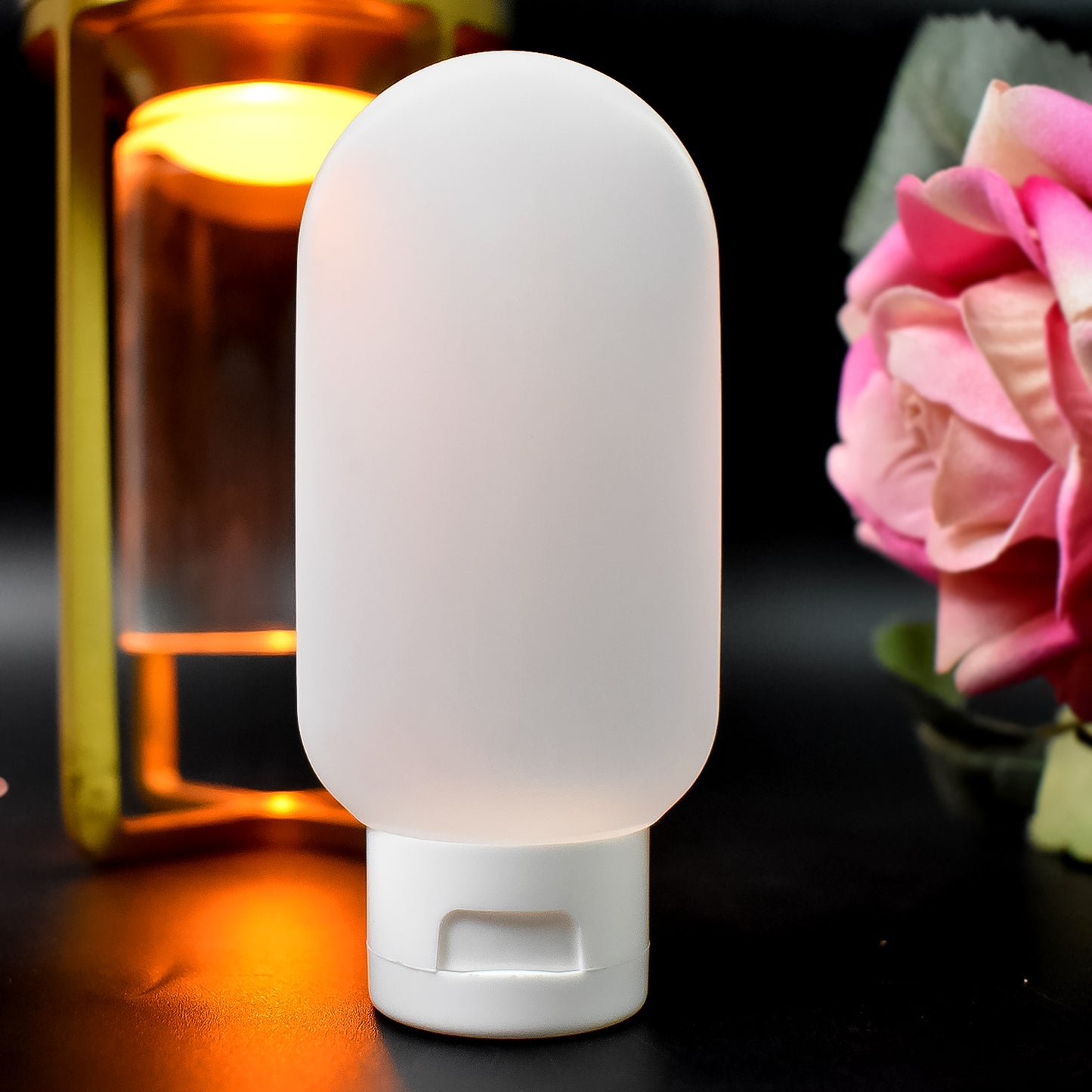 Small Wukusy plastic travel bottles set with colorful 60ml shampoo and conditioner bottles for convenient travel use.