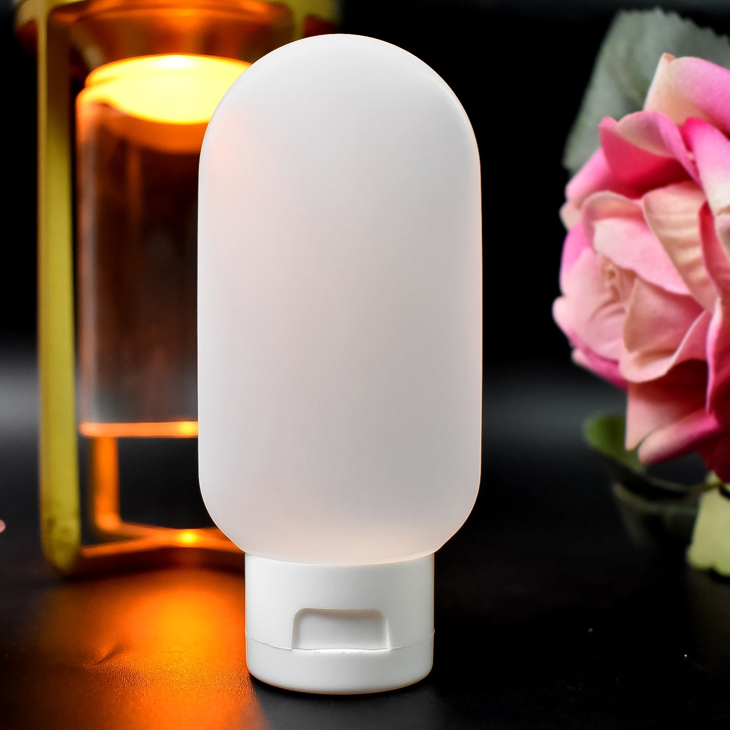 Small Wukusy plastic travel bottles set with colorful 60ml shampoo and conditioner bottles for convenient travel use.