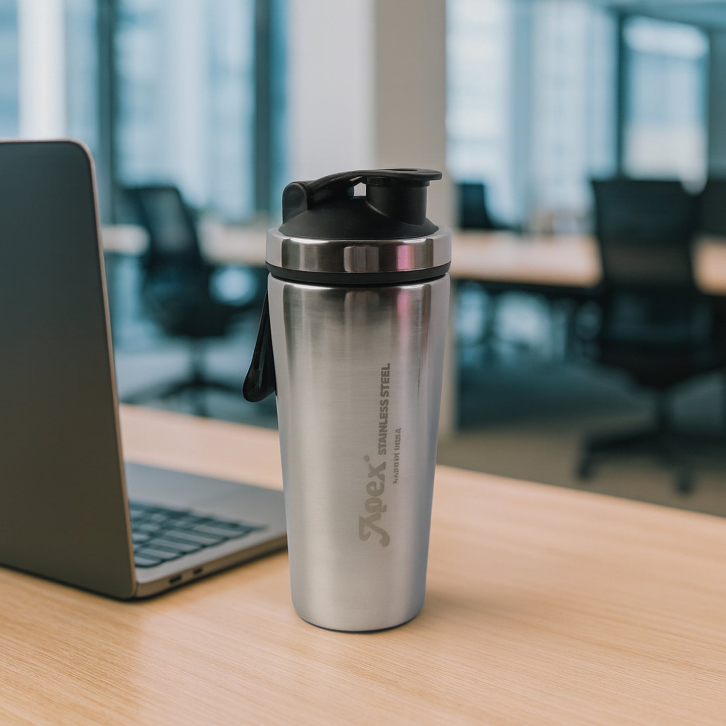 Wukusy Apex stainless steel gym shaker bottle with spring, 1000ml capacity, featuring a secure lid and mixing spring for smoothies and protein shakes.