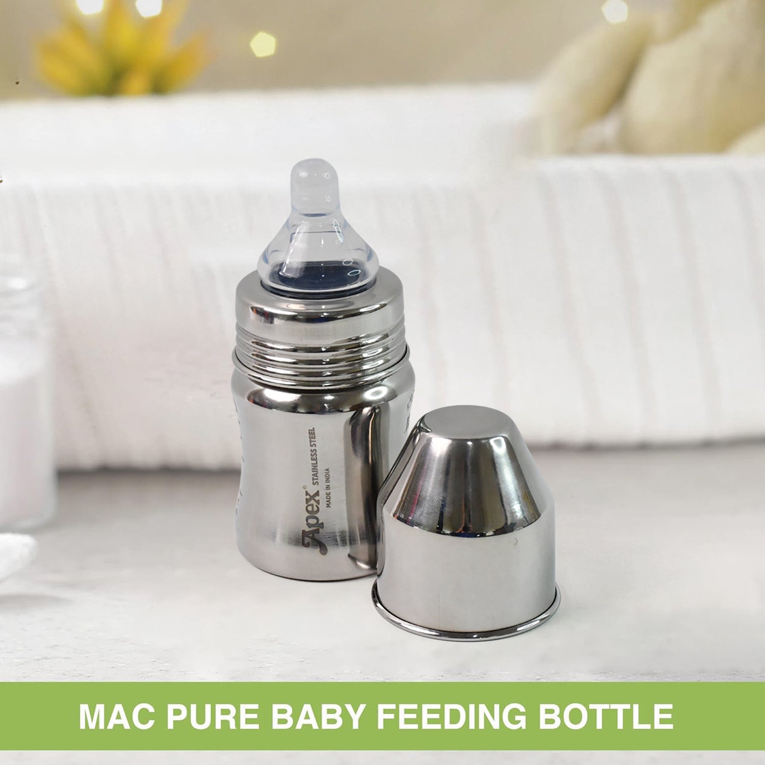 Wukusy Apex Premium stainless steel baby feeding bottle, 125ml, with a clear silicone nipple and ergonomic design.