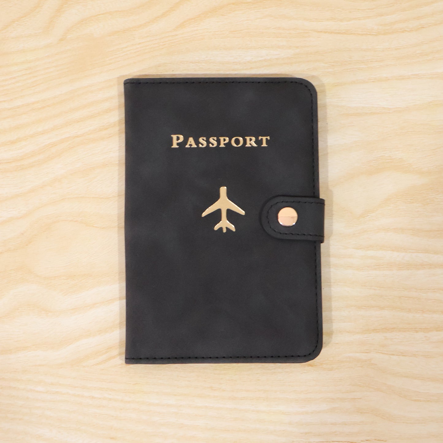 Wukusy mix travel passport holder wallet with multiple compartments for documents and cards, black leather cover case.