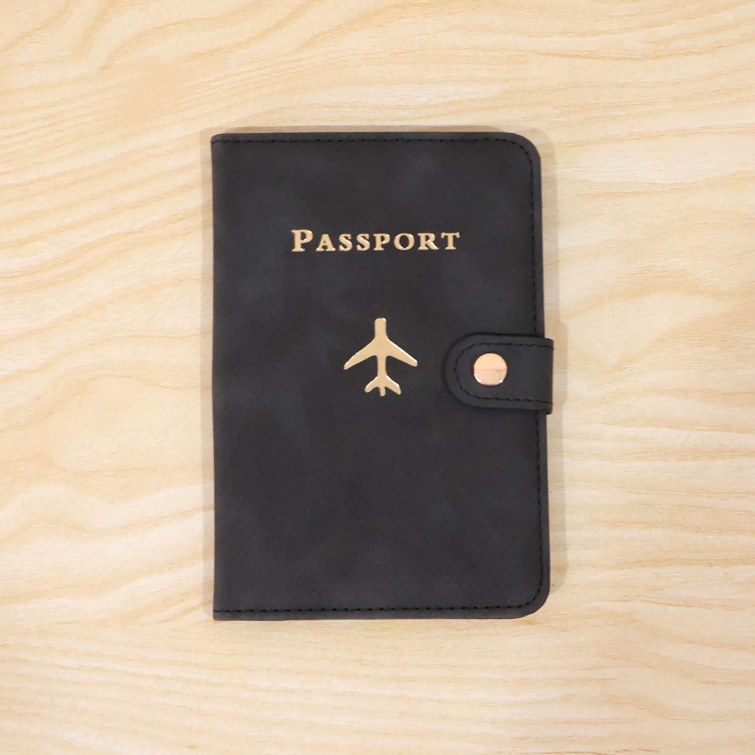 Wukusy mix travel passport holder wallet with multiple compartments for documents and cards, black leather cover case.