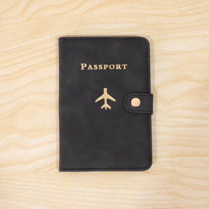 Wukusy mix travel passport holder wallet with multiple compartments for documents and cards, black leather cover case.