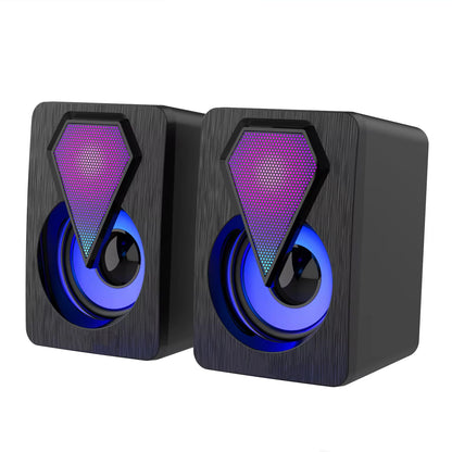 Wukusy RGB desktop speakers set with USB power, featuring vibrant lighting and compact design, ideal for computer audio.