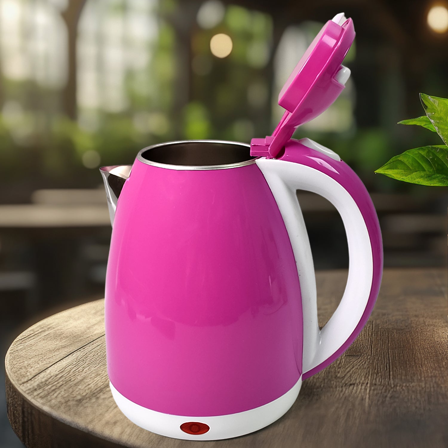 Wukusy stainless steel electric kettle, 1500 watt, 2-liter capacity, with a sleek stainless steel body and ergonomic handle.