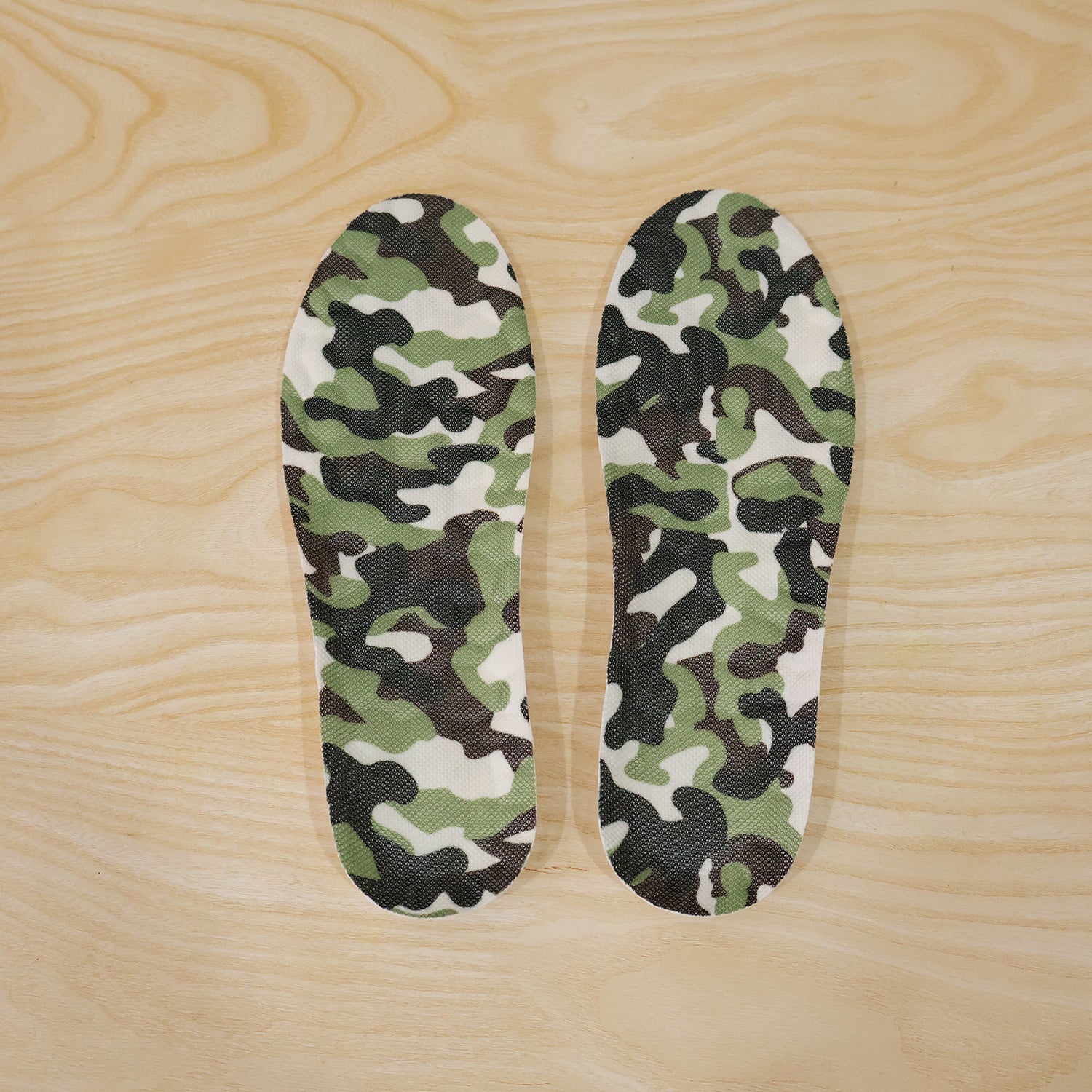 Pair of Wukusy camouflage comfort shoe insoles with soft cushioning for size 35 to 38, shown in the image.