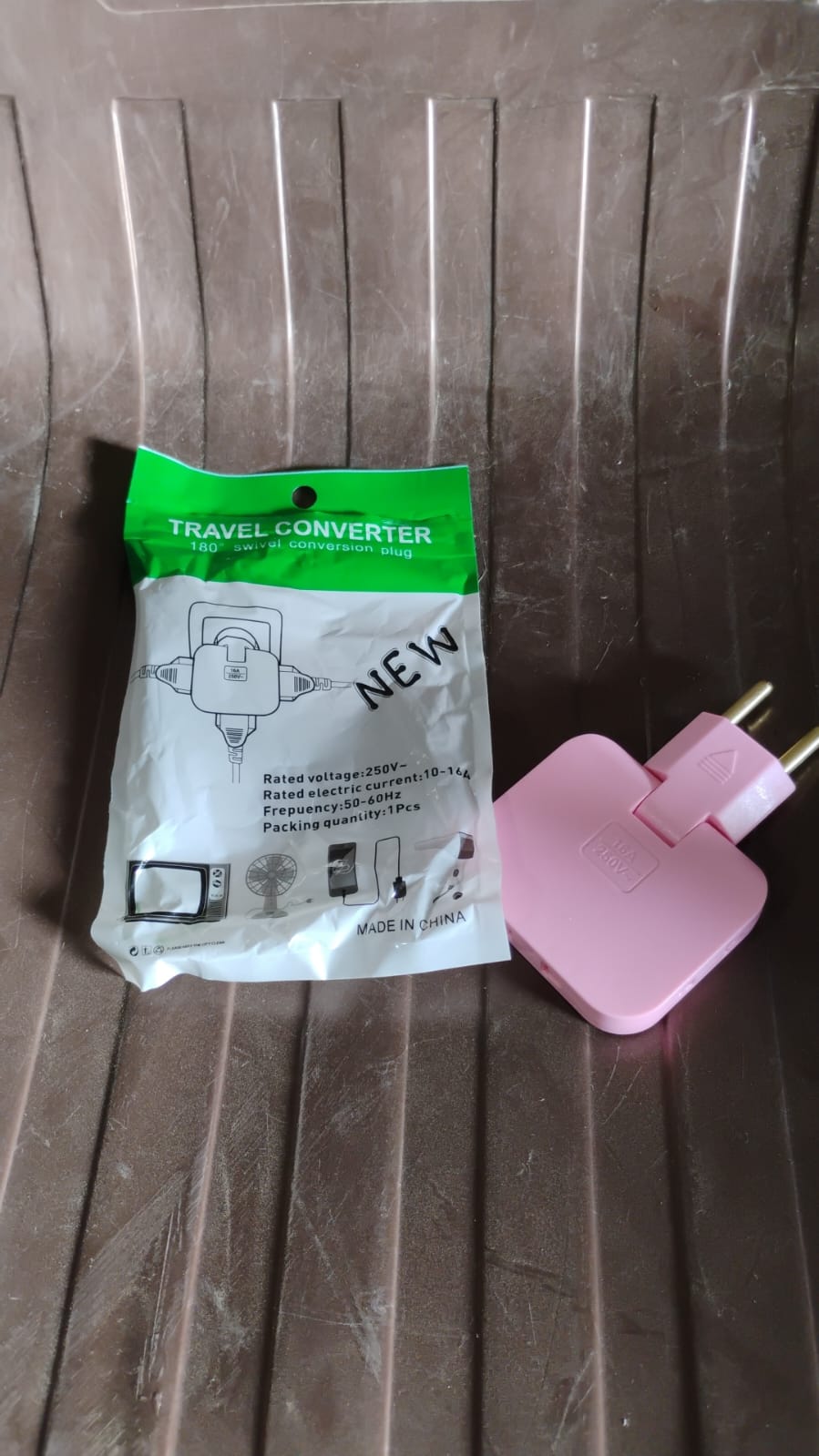 Wukusy wireless 3-in-1 foldable wall plug adapter with socket converter, showing its compact design and foldable prongs