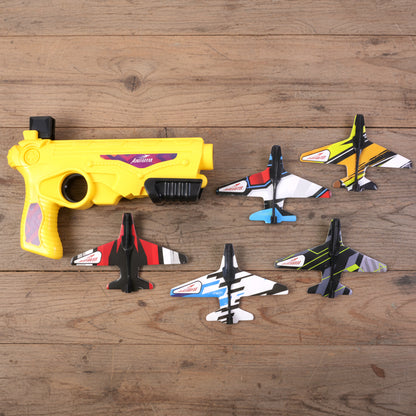 Wukusy Air Battle Plane Launcher Gun toy with foam glider set for kids, showcasing the foam plane and launcher in action.