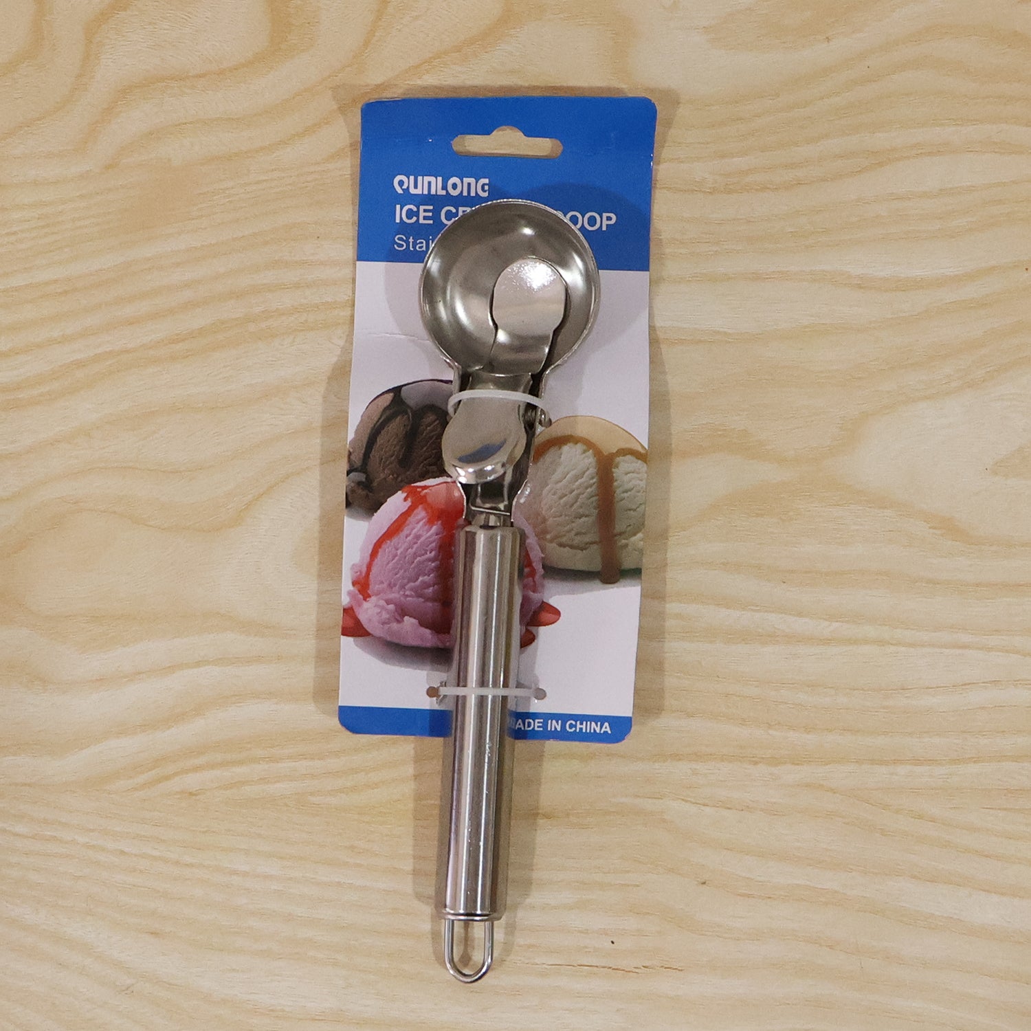 Wukusy stainless steel trigger release ice cream scoop and cookie dough scooper showing handle and scoop bowl for easy serving.