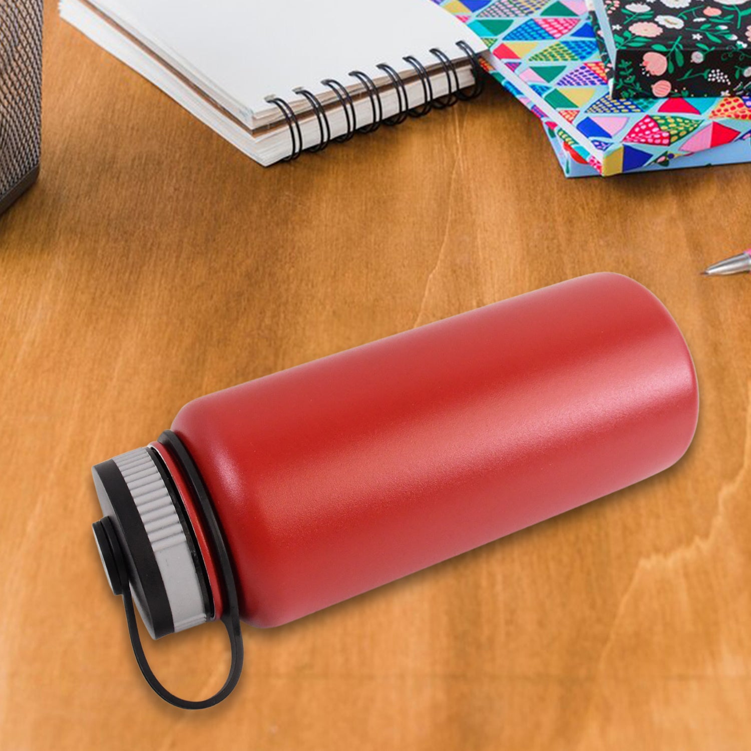 Wukusy stainless steel double wall vacuum-insulated water bottle, 1000 ml, in mix color, with a sleek, modern design.