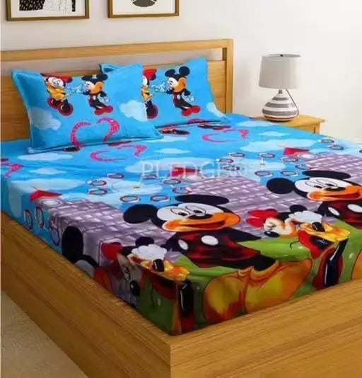 Ekom cotton double bed bedsheet with two matching pillow covers, soft and comfortable for bedroom use.