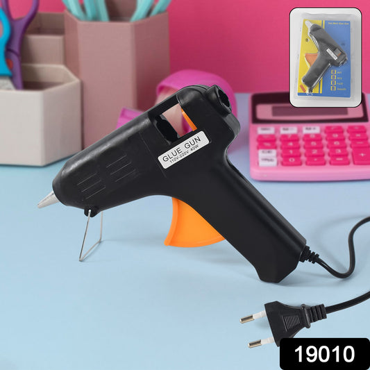 Wukusy professional hot melt glue gun with rapid heating, 40W power, suitable for multiuser use, shown with glue sticks ready to use