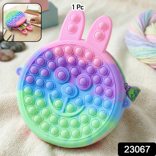 Cute caterpillar shape Pop It silicone pencil pouch by Wukusy, featuring colorful pop-it bubbles and a playful caterpillar design.