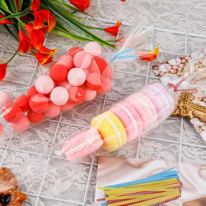 Set of 100 medium disposable piping bags by Wukusy, ideal for cake decorating and pastry work, shown filled with icing.