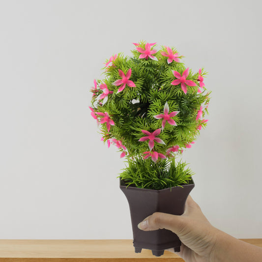 Artificial wild flower plant in a cute pot, ideal for home or office decor, tabletop, desk, or balcony indoor decoration by Wukusy.