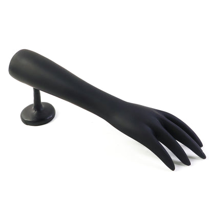 Black hand-shaped jewelry display stand by Wukusy, showcasing a realistic hand form for organizing rings and bracelets.